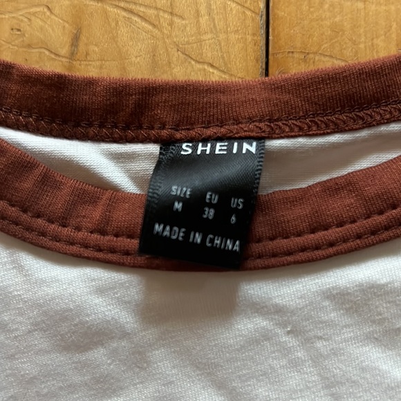 white t shirt with brown rim - Picture 2 of 3